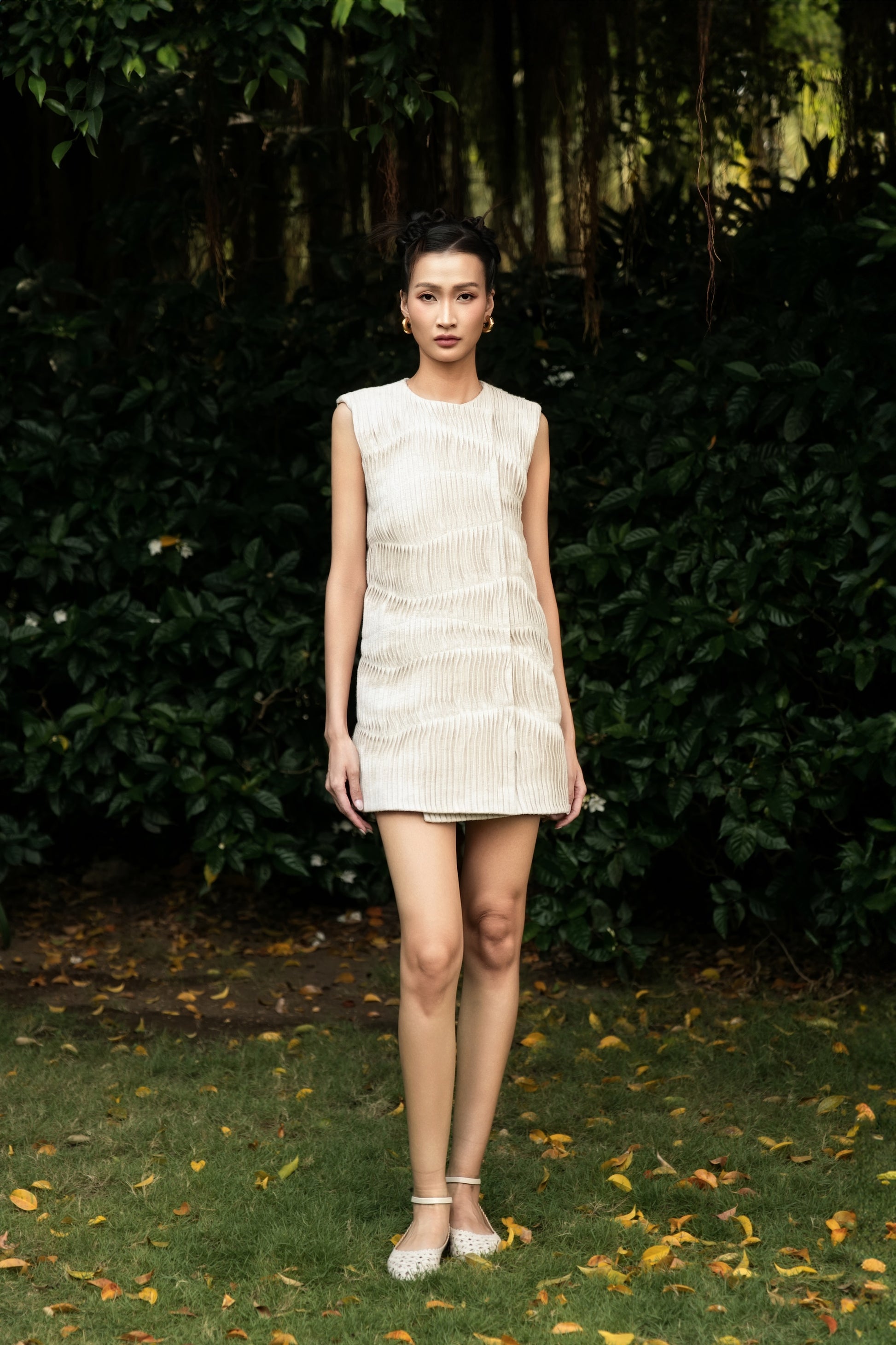 Elegans Textured Mini Dress